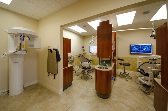 Modern dental office with X-ray machine.